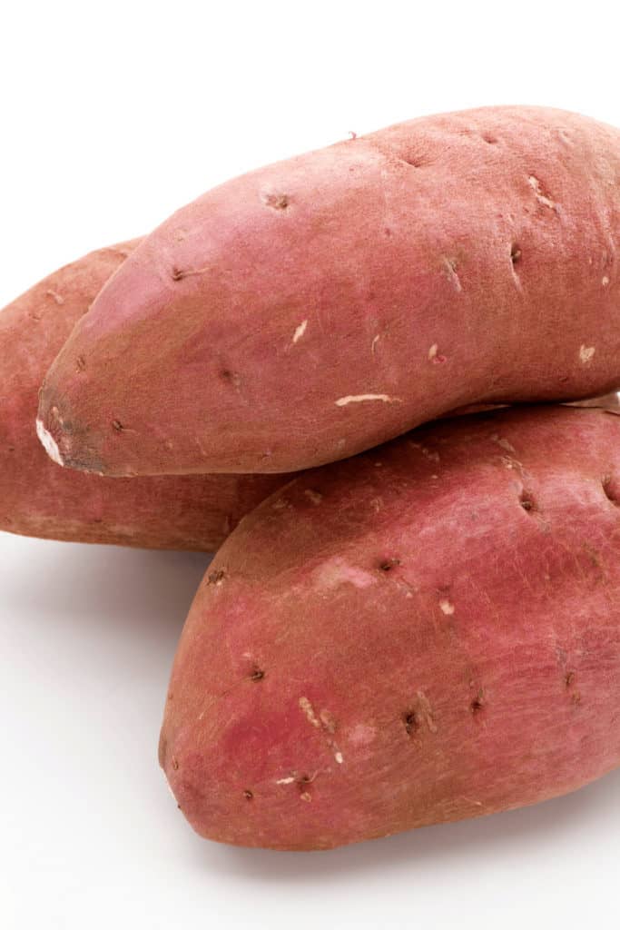 Storing sweet potatoes next to onions should be prevented as it leads to brown sweet potatoes