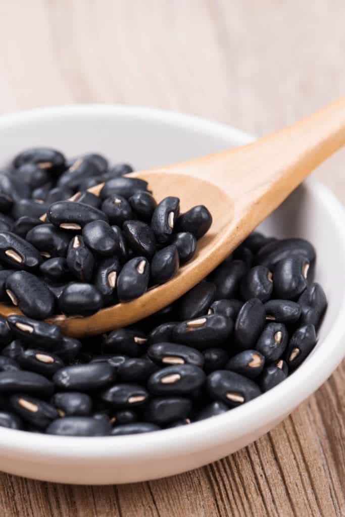 Black Beans are heated up under medium-high heat