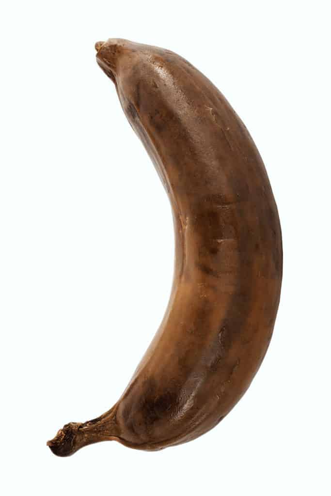 Smell on the banana. If it smells off you cannot eat it anymore