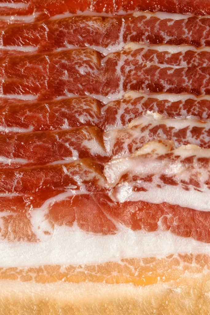 The flavor of vacuum sealed bacon is different and less intense