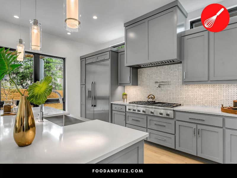 A clutter-free kitchen will be easier keep grease-free. Use cabinet space to store items you won't need to prevent grease from splattering over them.