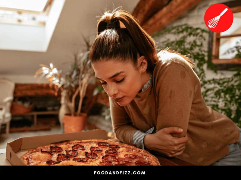 Before consuming cold pizza, check its appearance and odor. If there's discoloration, mold or off-smells, its best not to consume.