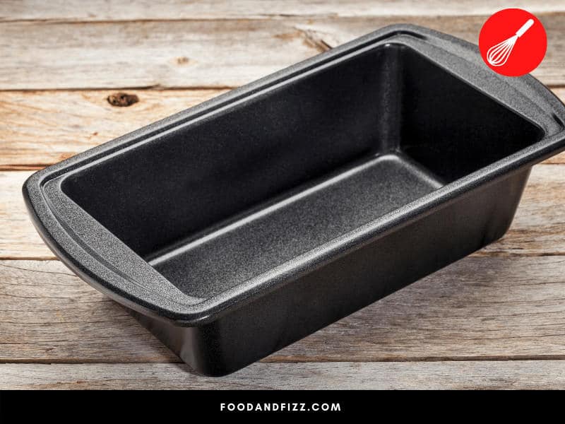 Dark aluminum baking dishes absorb more heat faster, which may cause the outside of your banana bread to brown and burn more easily.