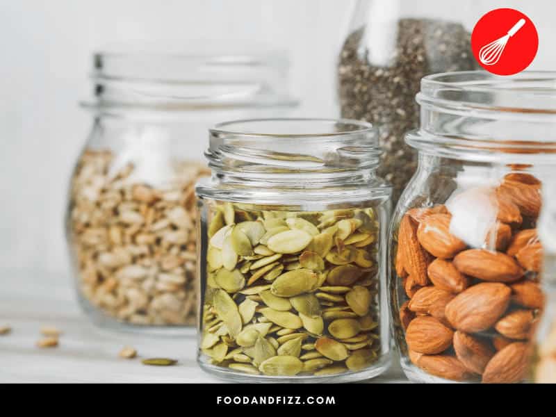 If you cannot store them in the fridge or the freezer, make sure to store nuts in tightly covered containers in a dark, cool place, away from light and air.