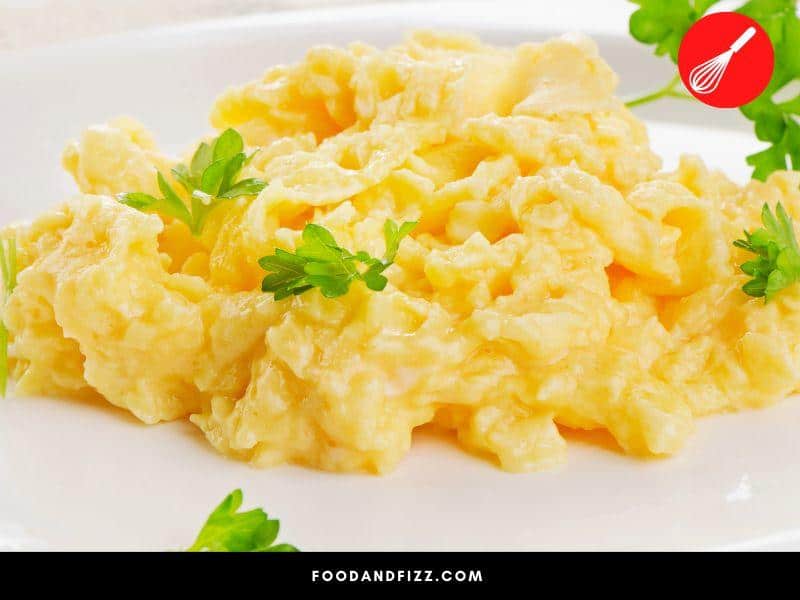 Eggs are a protein and continue to cook even after you’ve removed them from the heat. It is best to transfer your eggs to a plate while they are still runny.