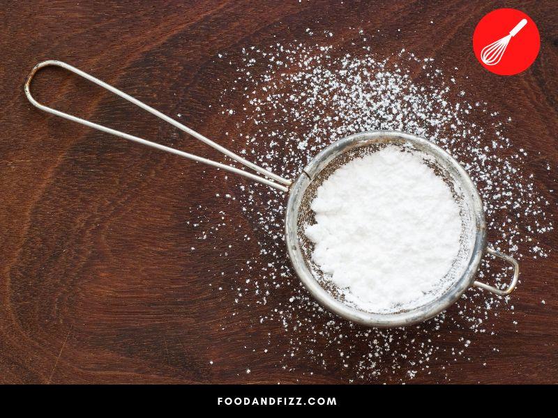 Powdered sugar is one of the best stabilizers of whipped cream, and adds sweetness to it too.