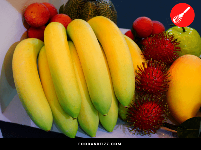 To stall the aging process of bananas, keep them away from other fruits as the ethylene released by other fruits may speed up its ripening.