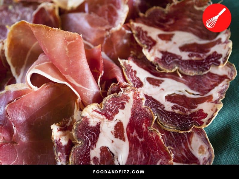 Nitrates and nitrites in cured meat are converted to nitrosamines when exposed to high heat. Nitrosamines are known carcinogens.
