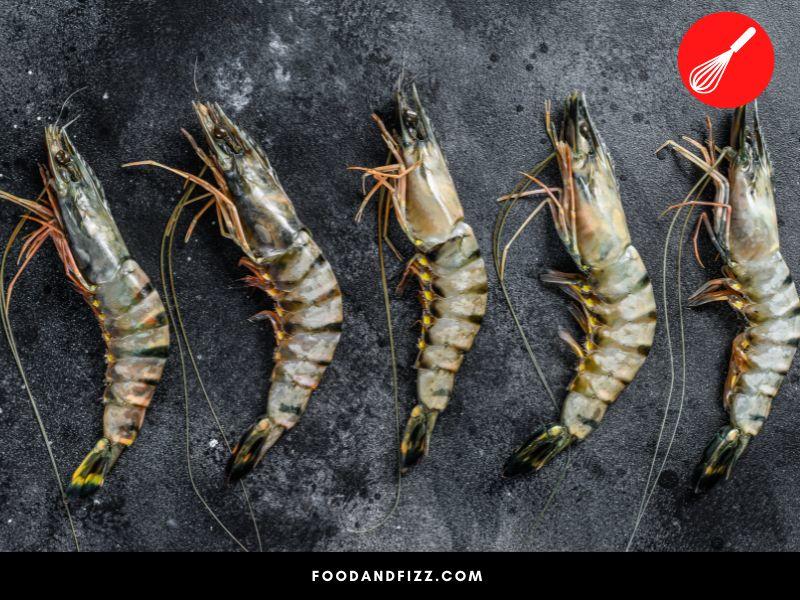 Tiger prawns are known for the stripes on their bodies, which turn orange or red when cooked.
